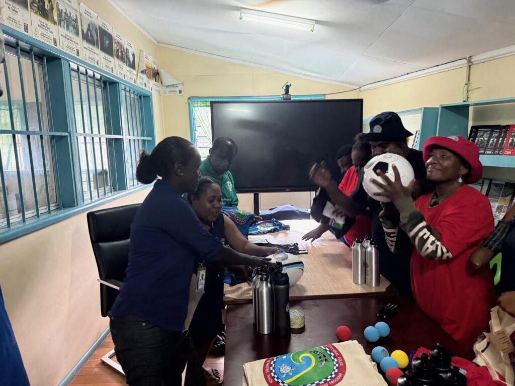 OiC Lucy handing out gifts at DPASI