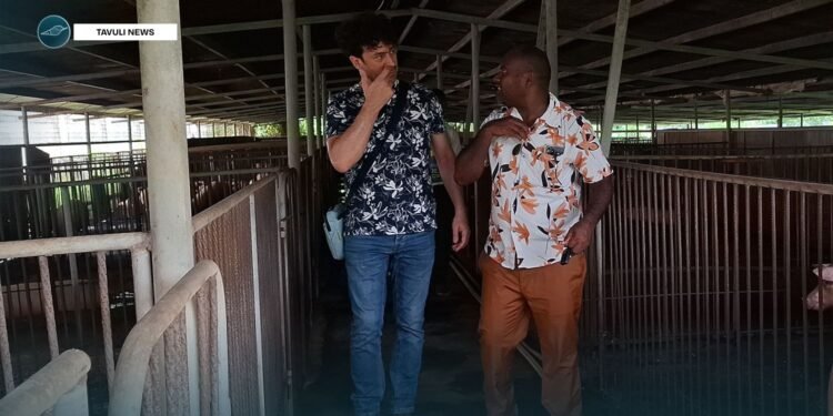 The team visiting one the piggery farms