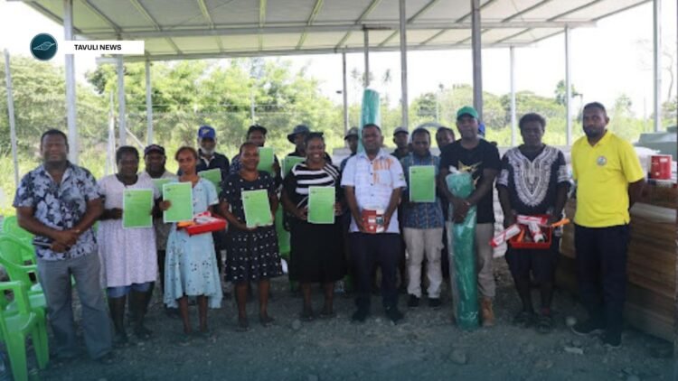 Member of Parliament for NGC, Dr. Paul Bosawai, with school recipient representatives flanked by constituency officers, showing off their handover certificates and some of the handover material supplies.