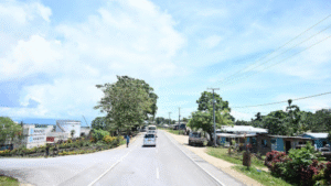 Key delegates taken on a brief tour along the rehabilitated Noro road.