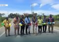 Cutting the ribbon to official open the Noro Road Improvement Project.