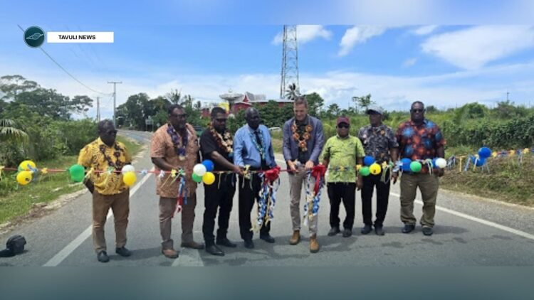 Cutting the ribbon to official open the Noro Road Improvement Project.