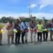 Cutting the ribbon to official open the Noro Road Improvement Project.
