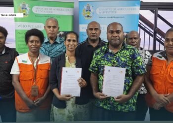 MALD Permanent Secretary Dr Samson Viulu and W ... ntha Charles with staff from MALD and WVSI