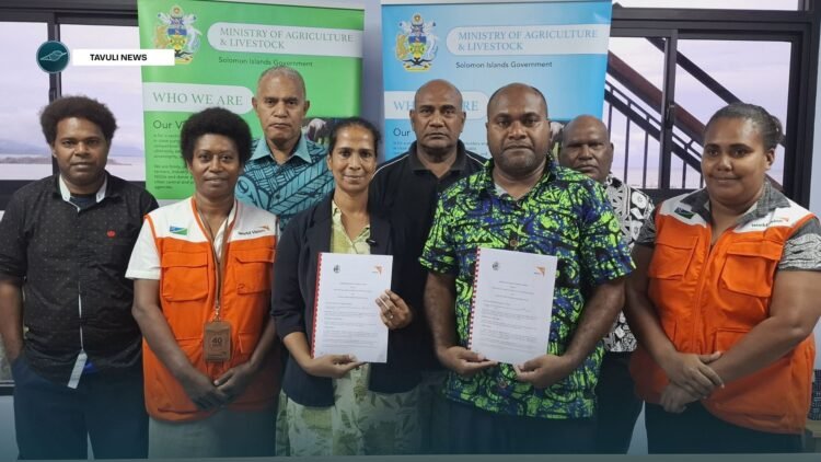 MALD Permanent Secretary Dr Samson Viulu and W ... ntha Charles with staff from MALD and WVSI