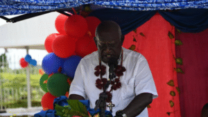 Church representative offering the dedication prayer.