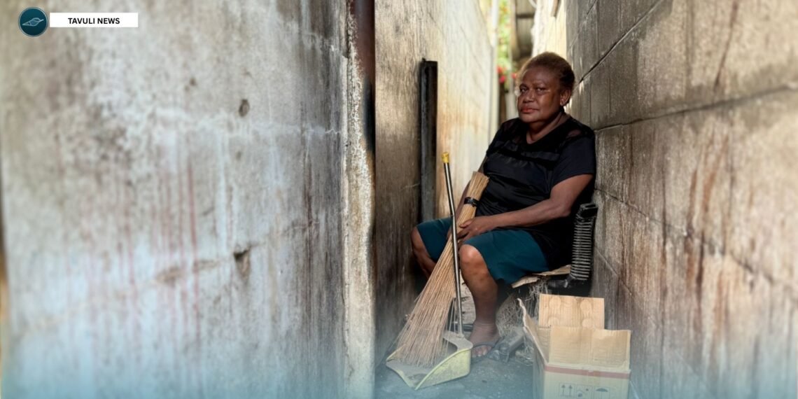 In a narrow alley in Honiara, Leah keeps going