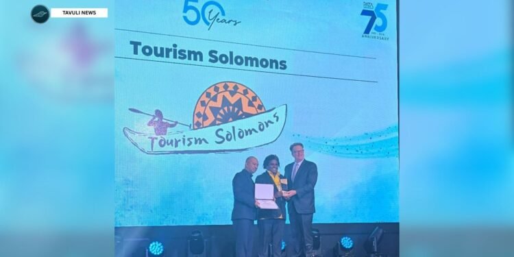 Tourism Solomons Acting CEO Dagnal Dereveke - centre is pictured receiving the award from on left) PATA CEO Noor Ahmad Hamid and on right PATA Chair Peter Semone.