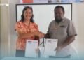 WVSI Operations Manager Irene Marbun and MPG Premier Elijah Asilaua sign the Memorandum of Understanding (MoU) in Auki, Malaita Province.