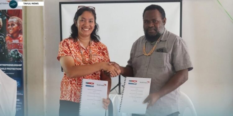 WVSI Operations Manager Irene Marbun and MPG Premier Elijah Asilaua sign the Memorandum of Understanding (MoU) in Auki, Malaita Province.