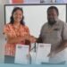 WVSI Operations Manager Irene Marbun and MPG Premier Elijah Asilaua sign the Memorandum of Understanding (MoU) in Auki, Malaita Province.