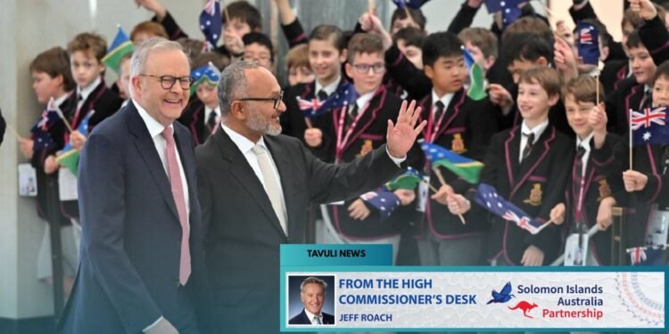 Australian Prime Minister Anthony Albanese and Solomon Islands Prime Minister Matthew Wale greeting school children at the Australian Parliament House.