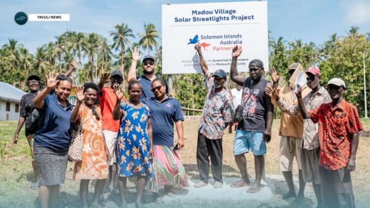 John Hutton, First Secretary, Australian High Commission with community members from Madou Village celebrating the official handover of their Solomon Islands – Australia Community Partnerships project.