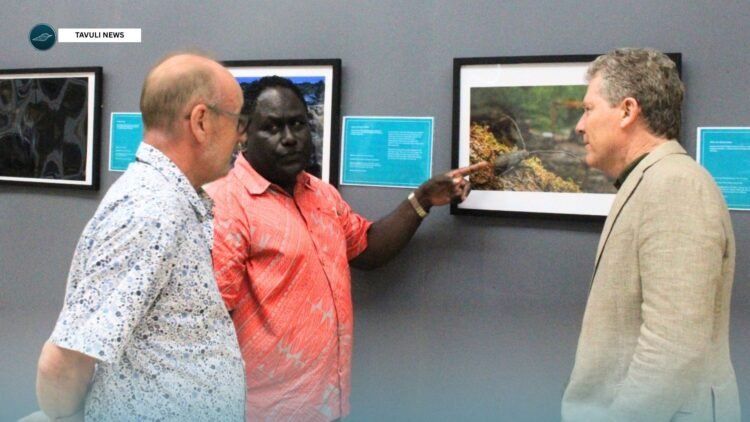 High Commissioner Turner, PS Sivoro and Nick Dixon, Exhibition Advisor to the Solomon Islands National Museum Division viewing the exhibition.