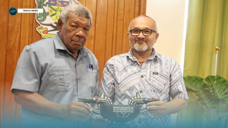 Prime Minister  Wale receiving a traditional gift from Premier Hon. Stanley Siapu after their meeting, reflecting the strong partnership and goodwill between both governments