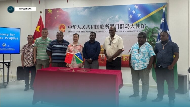 Group Photo; Ambasssador Cai Weiming and Minister Ghemu with other officlas