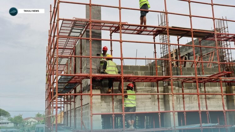 Local construction workers in Auki at the construction of the new modern agriculture office building for Malaita Province.