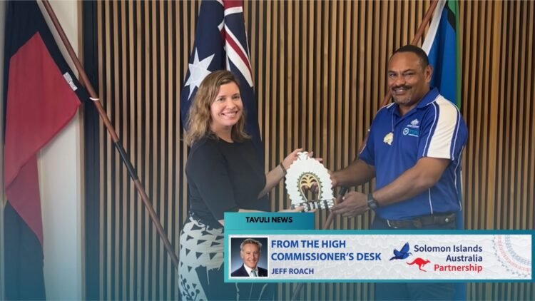 AHC First Secretary Public Sector Governance, Eliza Woolcook presents a commemorative gift, highlighting the strong partnership between Australia and Solomon Islands.