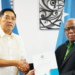 Foreign Affairs Minister Rick Houenipwela (right) congratulates Johnny Sy following his appointment as the Philippines' honorary consul to Solomon Islands. Photo: MFAET