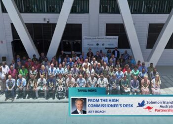 Delegates, employers, government representatives and partners gather for a group photo during the PALM Expo in Honiara.